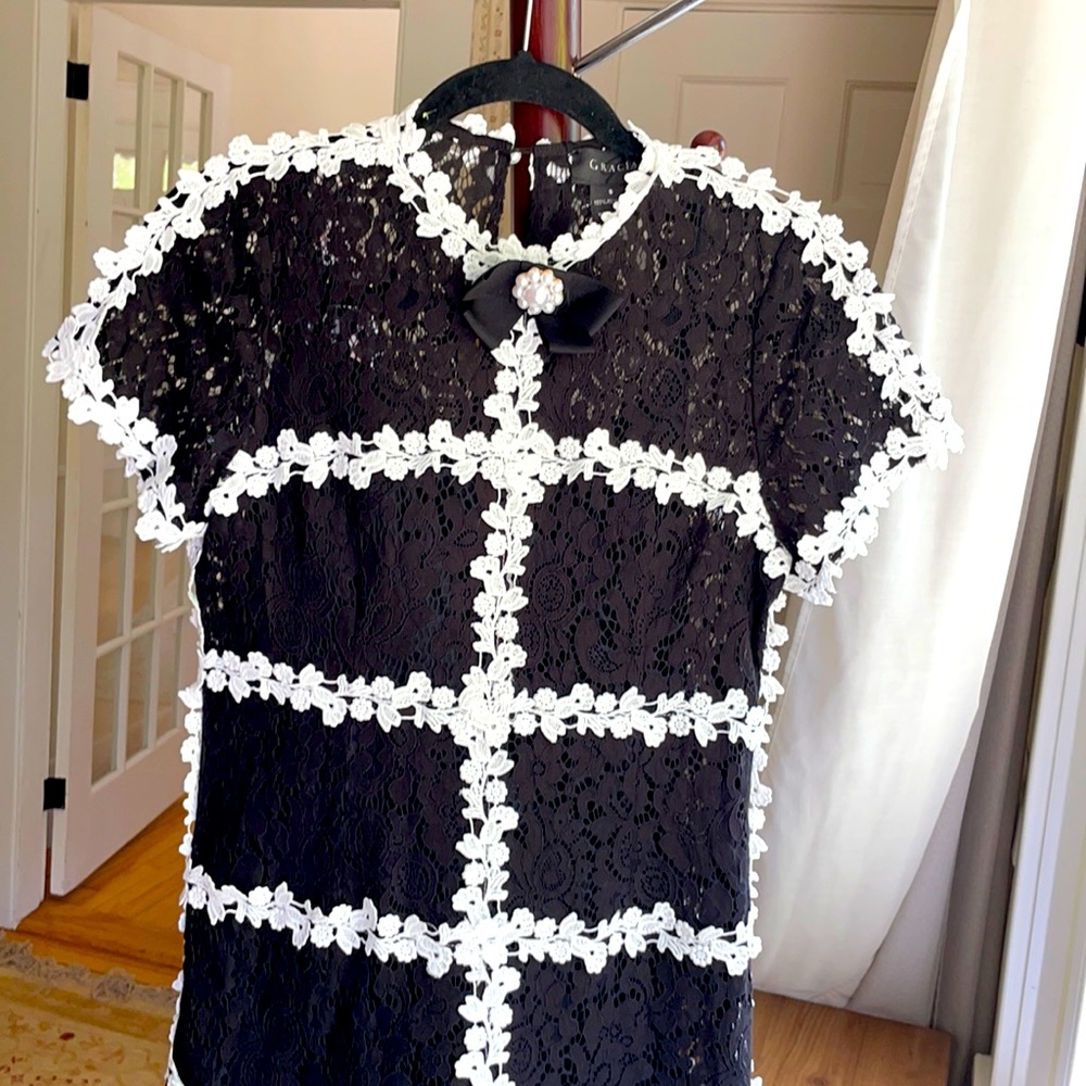 Chic Guipure Lace in a delicate vintage floral Satin lining.